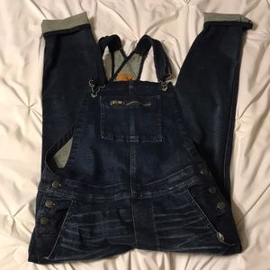 American eagle dark washed skinny overalls